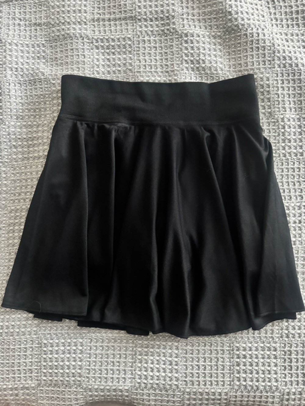 OQQ Black skirt with shorts. NWOT.